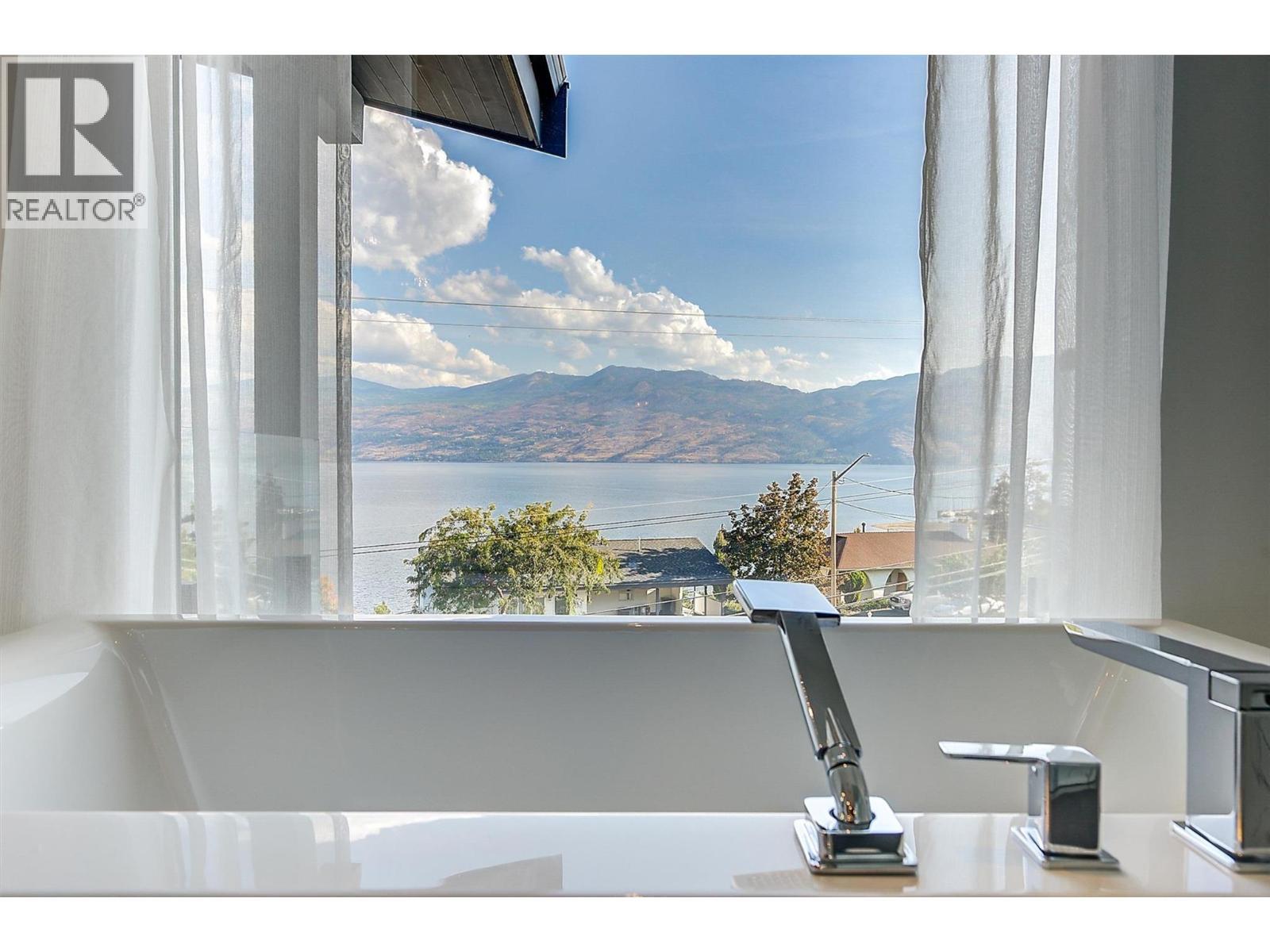 3961 Beachview Drive E, West Kelowna, BC - With Body Of Water