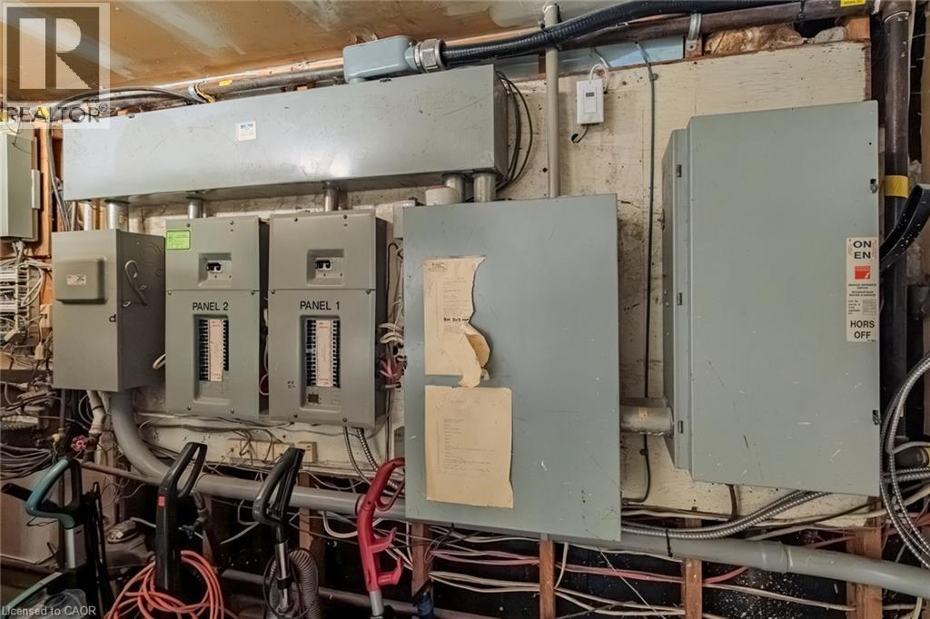 Utility room featuring electric panel - 30 John Street, Port Dover, ON