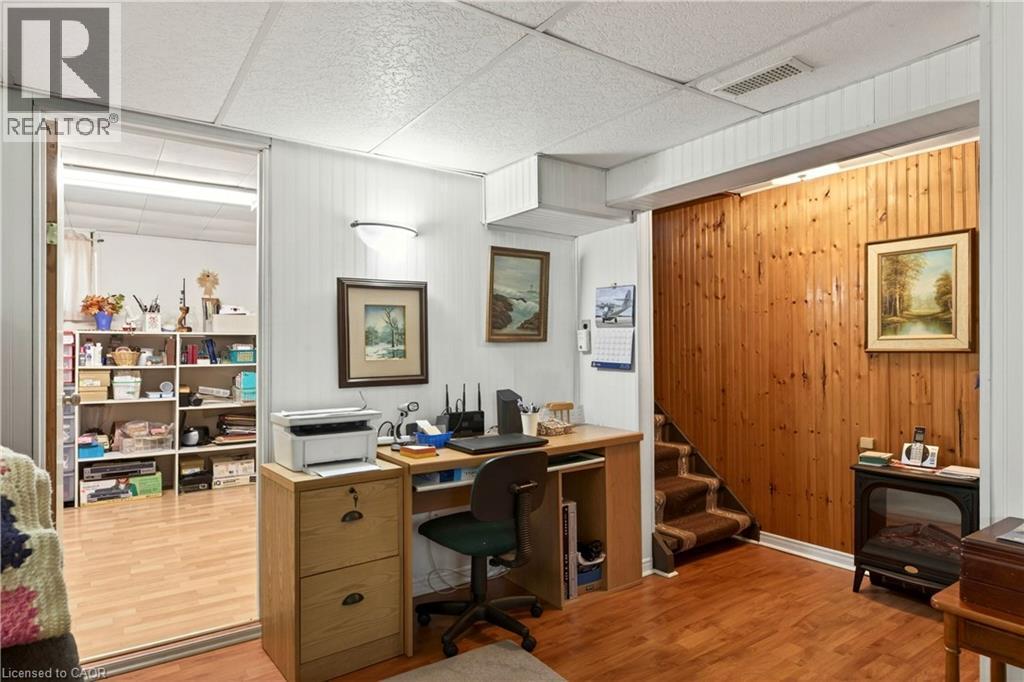 Office area with light wood-style flooring and a paneled ceiling - 944 Garth Street, Hamilton, ON - Indoor Photo Showing Office