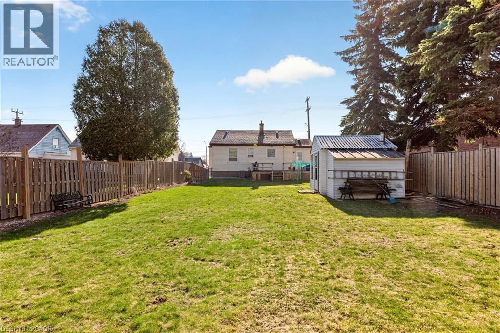 Fenced backyard with an outdoor structure - 944 Garth Street, Hamilton, ON - Outdoor