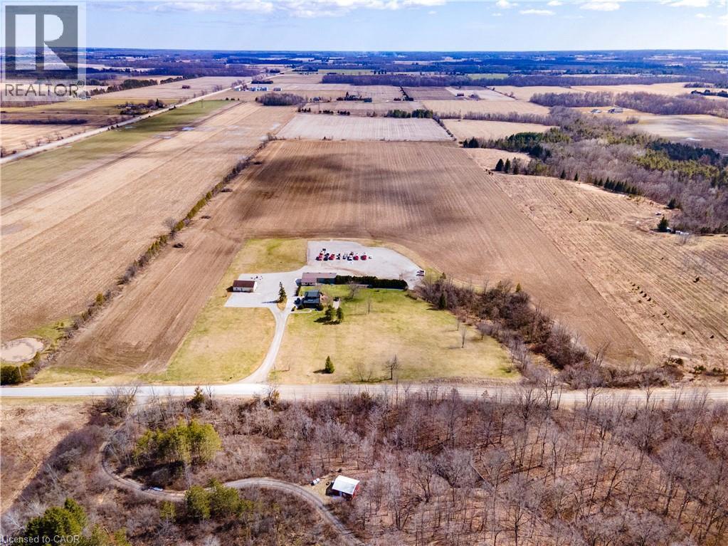 Aerial view of sparsely populated area with farmland - 23247 Beattie Line, Elgin, ON - Outdoor