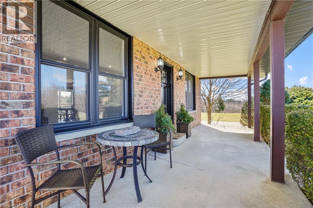 View of covered porch - 23247 Beattie Line, Elgin, ON - Outdoor With Deck Patio Veranda With Exterior