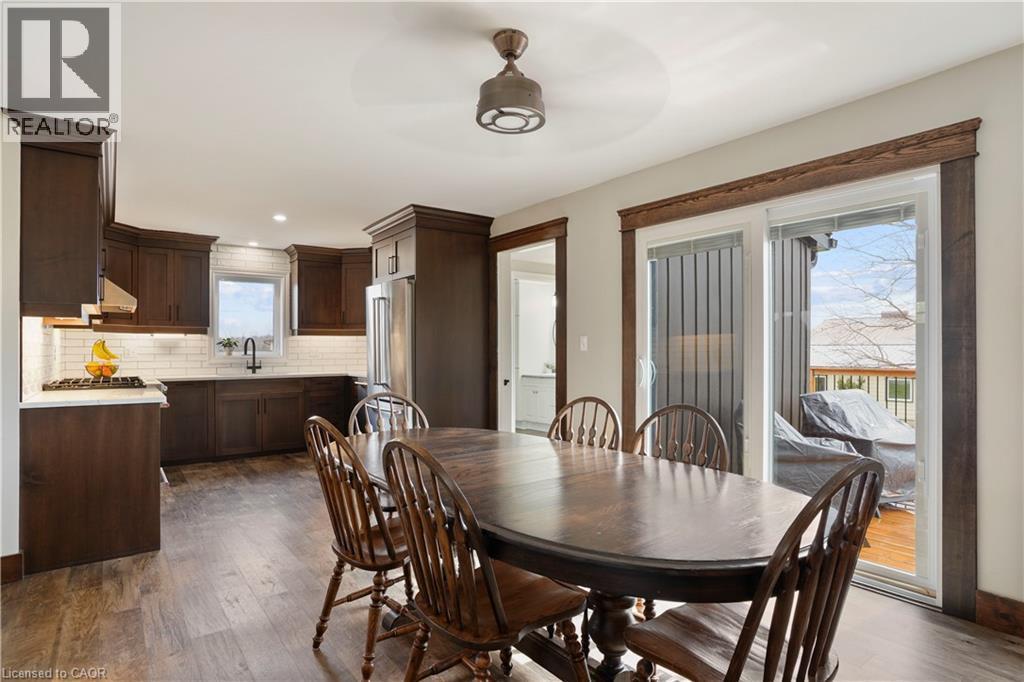 Dining space with ceiling fan, dark wood finished floors, and recessed lighting - 23247 Beattie Line, Elgin, ON - Indoor Photo Showing Dining Room