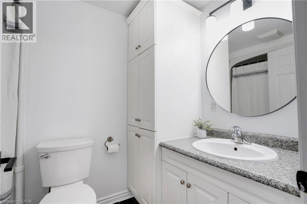 Full bath featuring vanity and a shower with curtain - 23247 Beattie Line, Elgin, ON - Indoor Photo Showing Bathroom