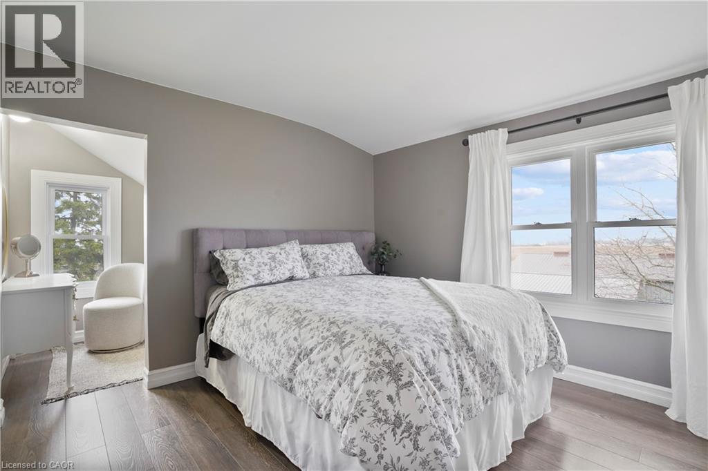 Bedroom with wood-type flooring and vaulted ceiling - 23247 Beattie Line, Elgin, ON - Indoor Photo Showing Bedroom