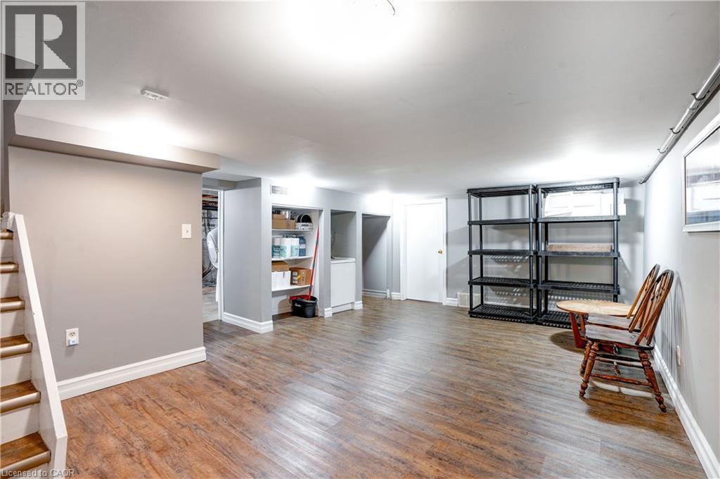 Unfurnished room featuring wood finished floors and baseboards - 23247 Beattie Line, Elgin, ON - Indoor