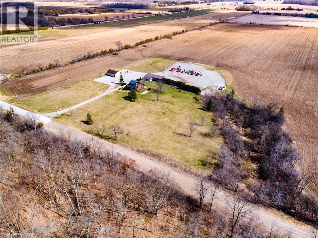 Aerial view of sparsely populated area with abundant farmland - 23247 Beattie Line, Elgin, ON - Outdoor With View
