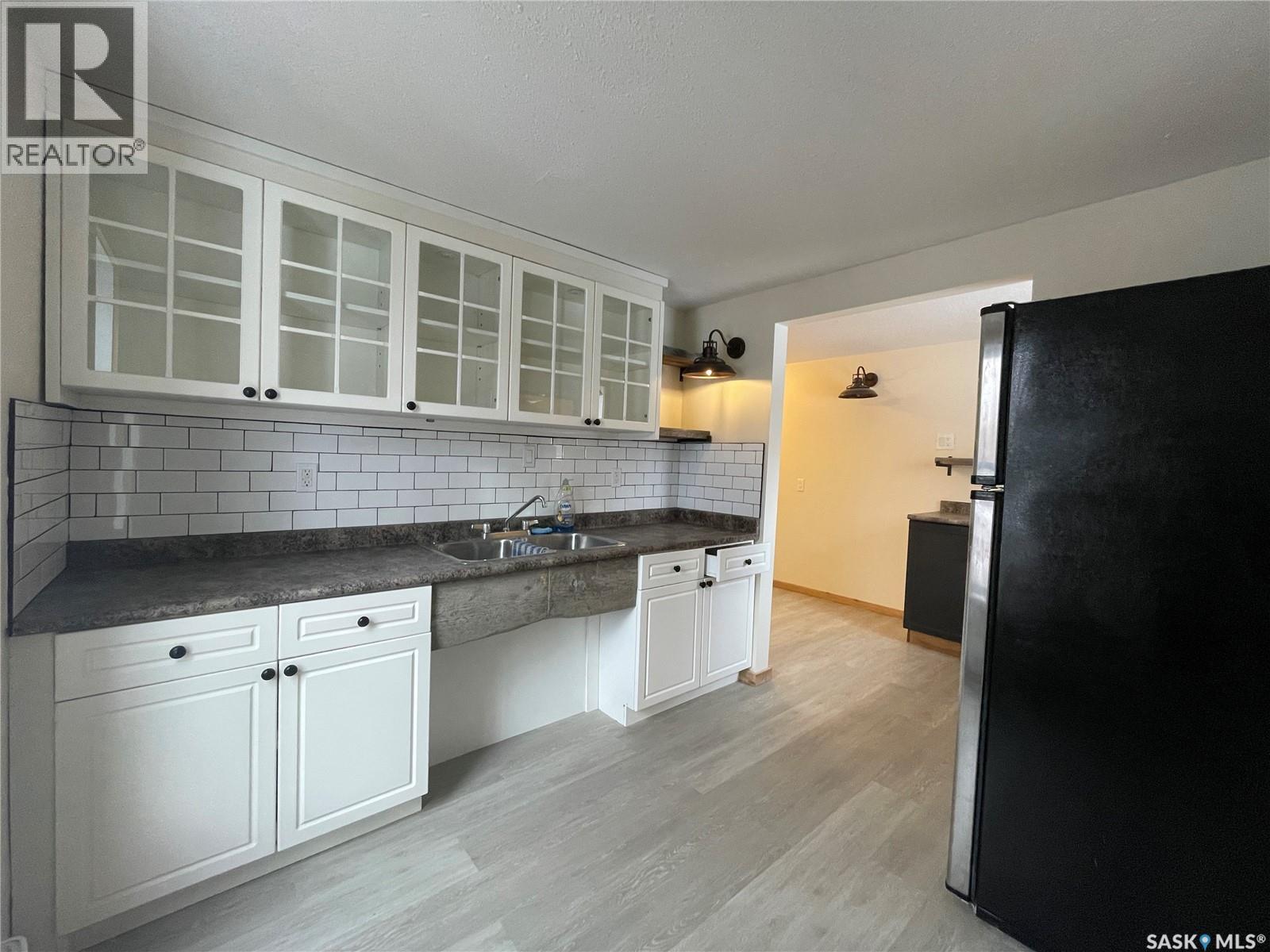608 Whyte Street, Loreburn, SK - Indoor Photo Showing Kitchen With Double Sink