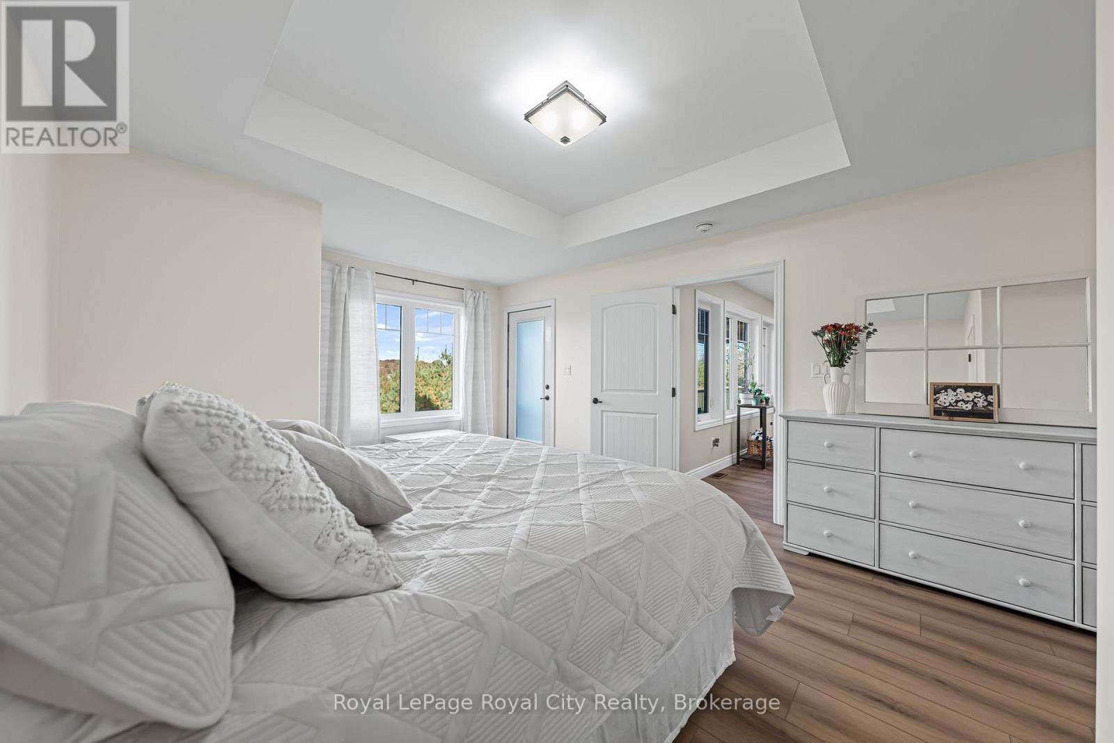 Primary Bedroom w deck access - 103 Marshall Heights Road, West Grey, ON - Indoor Photo Showing Bedroom