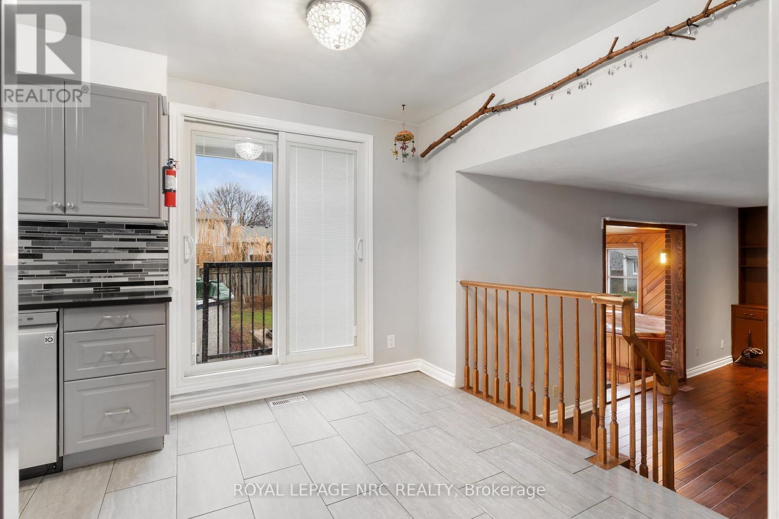 Walk-out to pool deck - 64 Adel Drive, St. Catharines (Carlton/Bunting), ON - Indoor Photo Showing Other Room