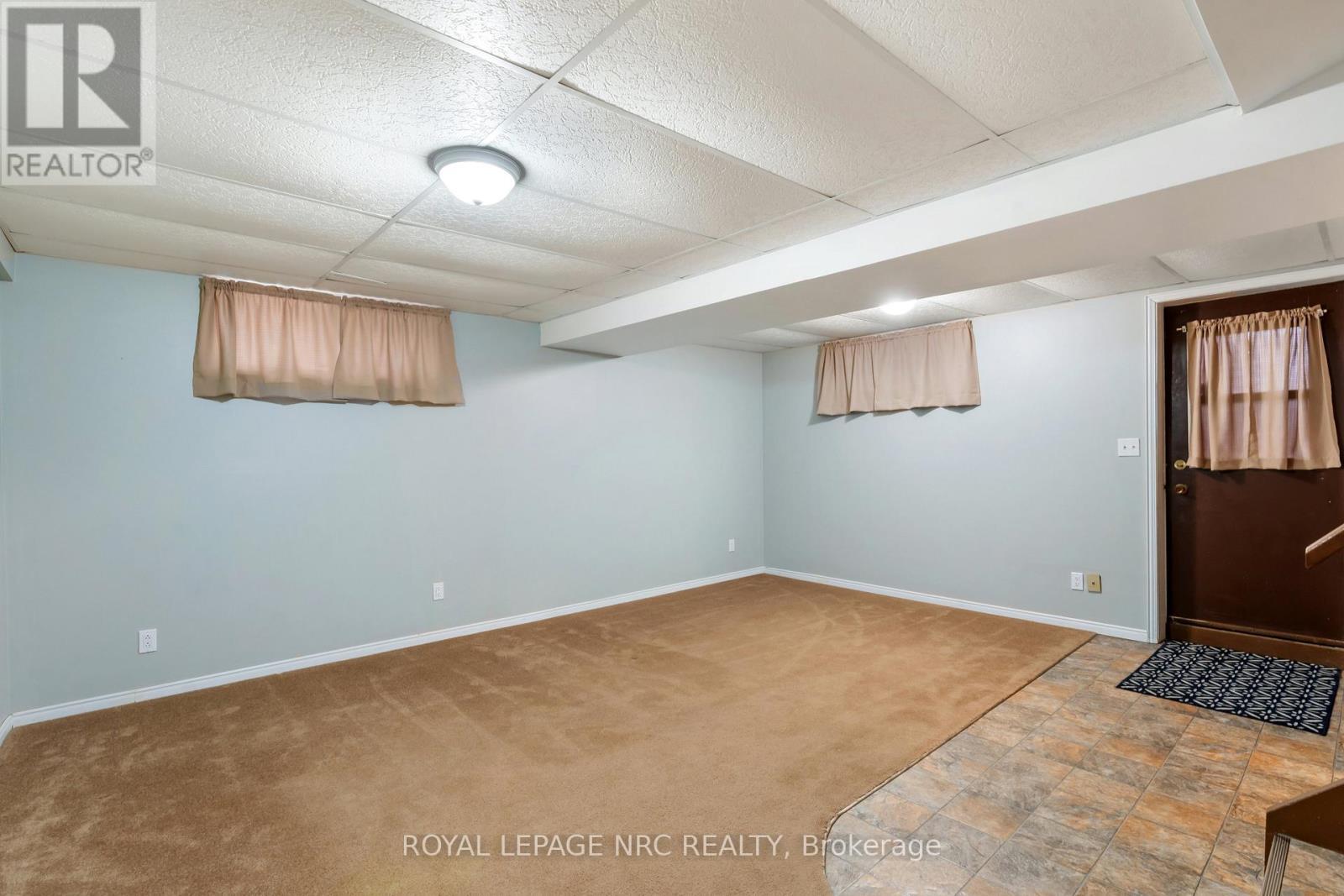 Recreation/games room with separate entrance - 64 Adel Drive, St. Catharines (Carlton/Bunting), ON - Indoor
