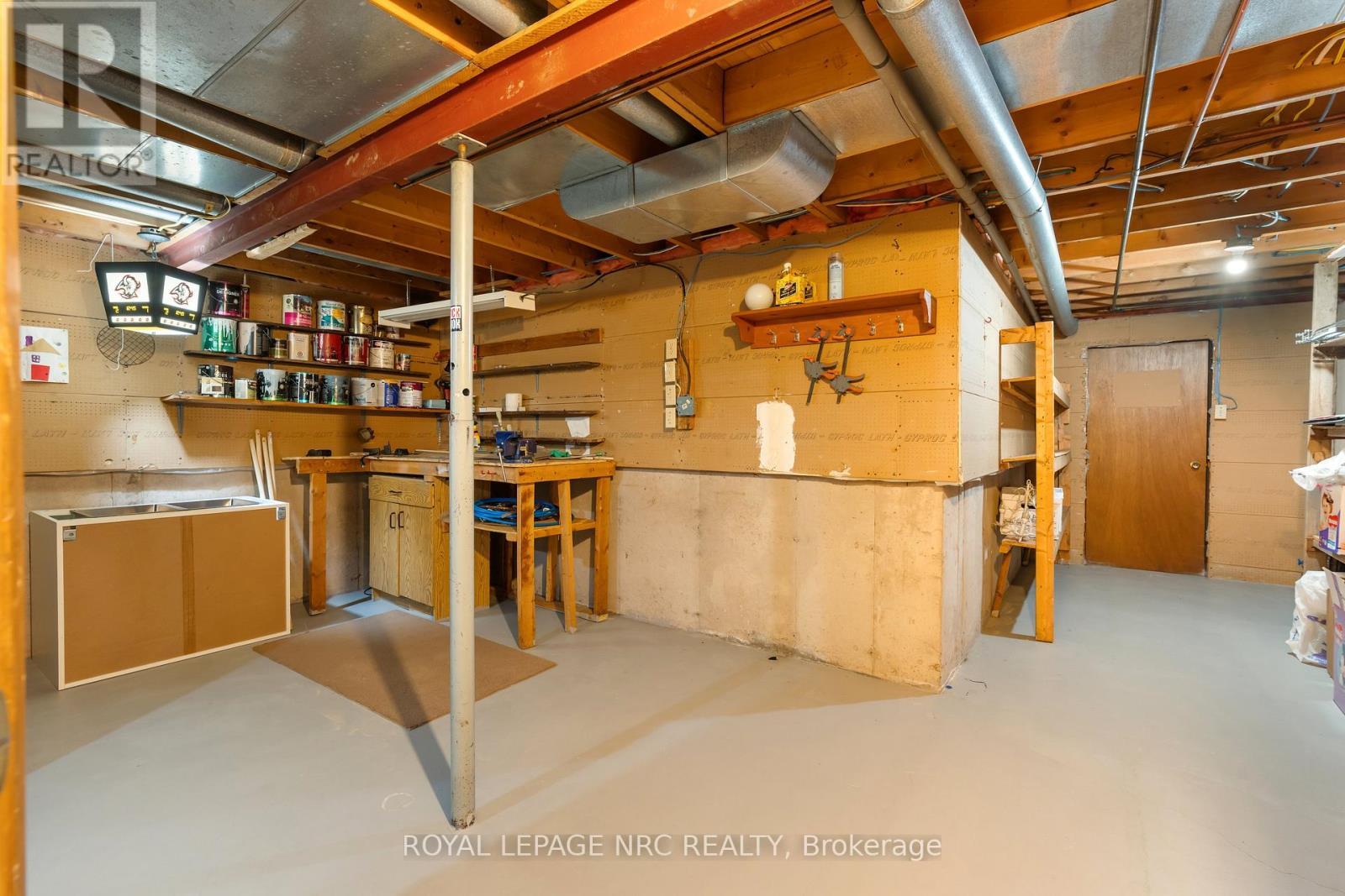 Workshop & storage area - 64 Adel Drive, St. Catharines (Carlton/Bunting), ON - Indoor Photo Showing Basement
