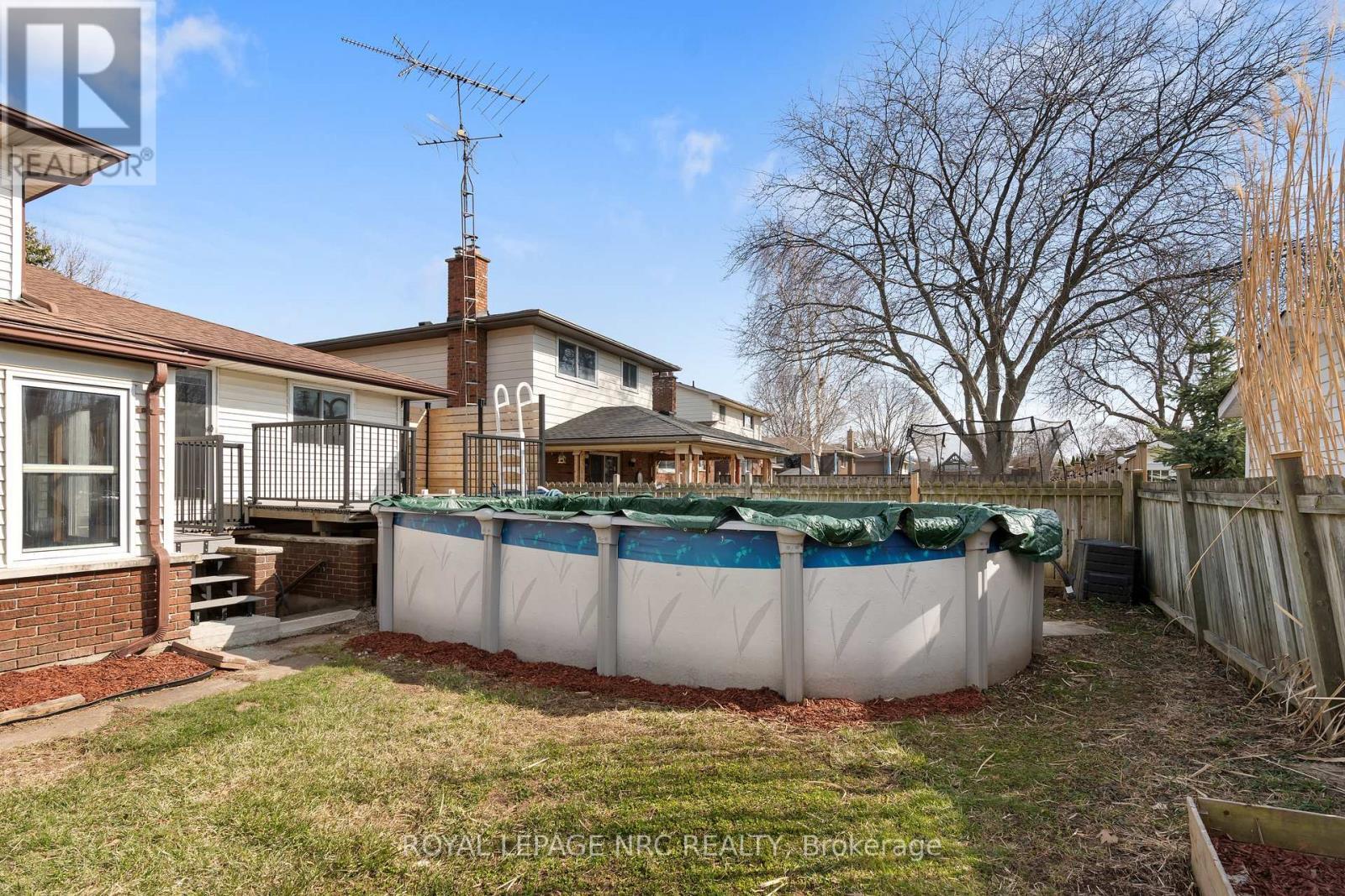 64 Adel Drive, St. Catharines (Carlton/Bunting), ON - Outdoor With Above Ground Pool With Backyard