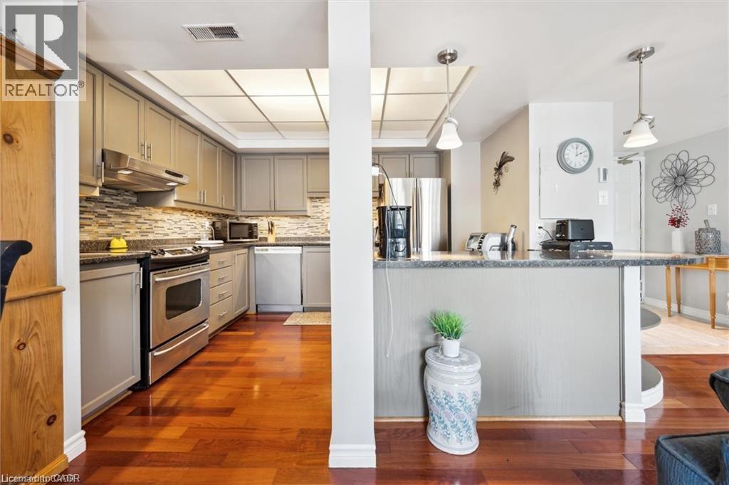3267 King Street E Unit# 204, Kitchener, ON - Indoor Photo Showing Kitchen With Stainless Steel Kitchen With Upgraded Kitchen