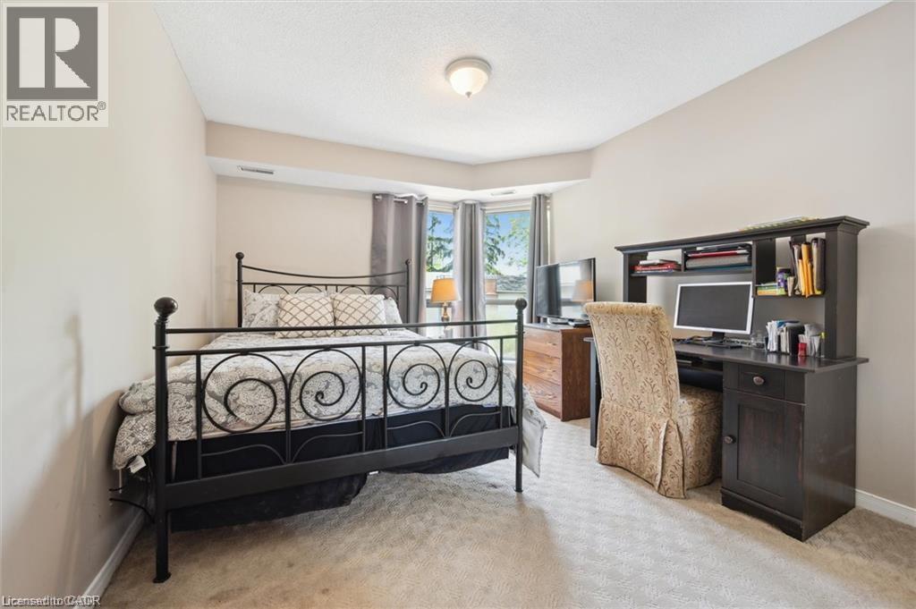 3267 King Street E Unit# 204, Kitchener, ON - Indoor Photo Showing Bedroom