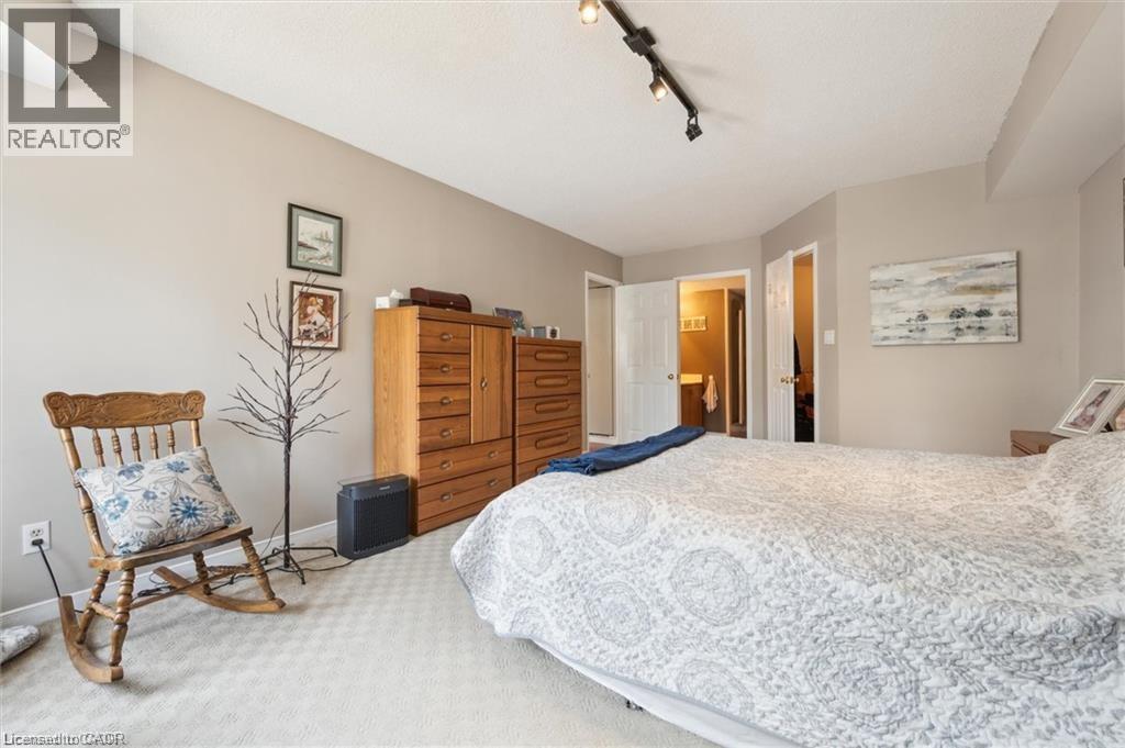 3267 King Street E Unit# 204, Kitchener, ON - Indoor Photo Showing Bedroom