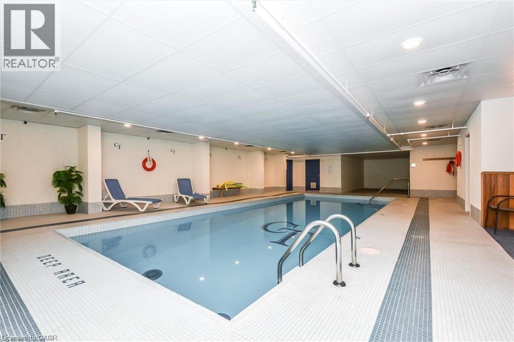 3267 King Street E Unit# 204, Kitchener, ON - Indoor Photo Showing Other Room With In Ground Pool