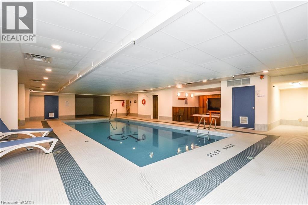 3267 King Street E Unit# 204, Kitchener, ON - Indoor Photo Showing Other Room With In Ground Pool