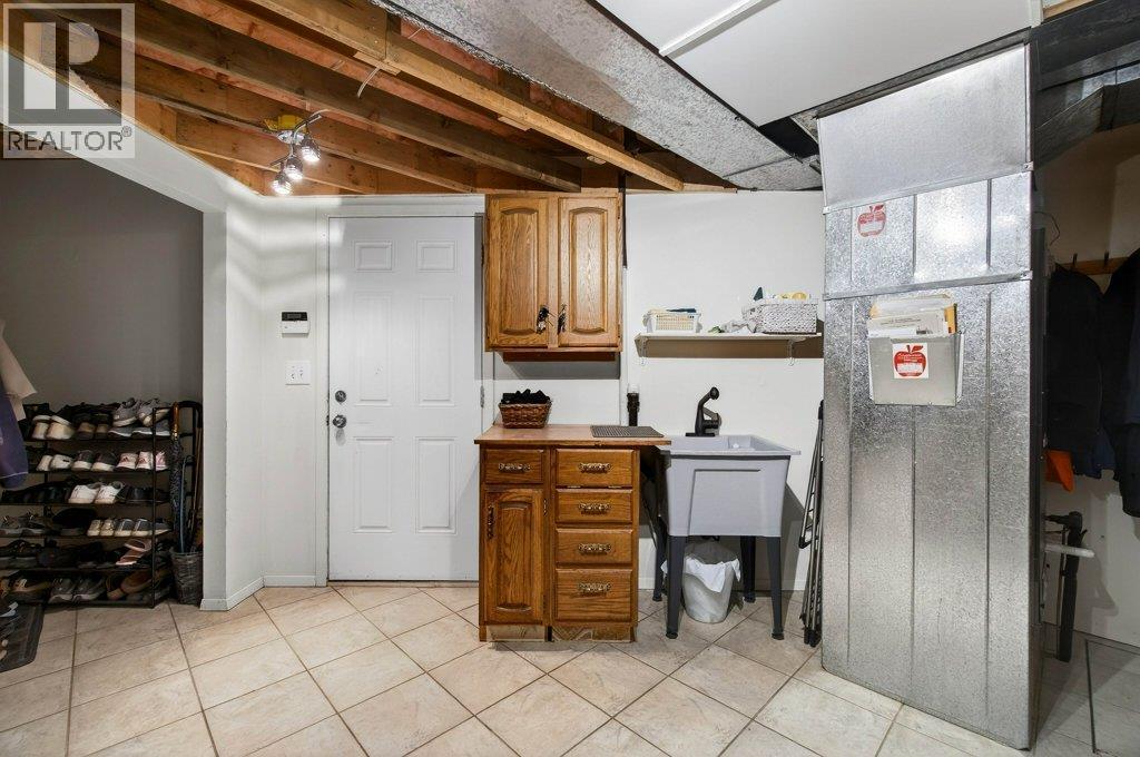 7905 97A Highway, Mara, BC - Indoor Photo Showing Basement