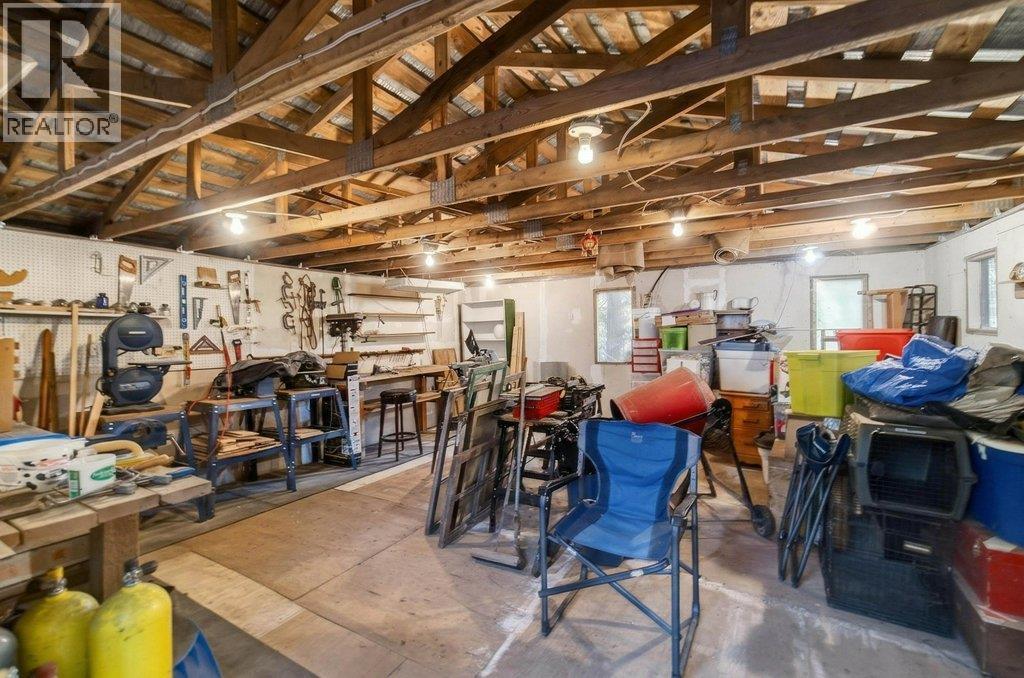 7905 97A Highway, Mara, BC - Indoor Photo Showing Basement
