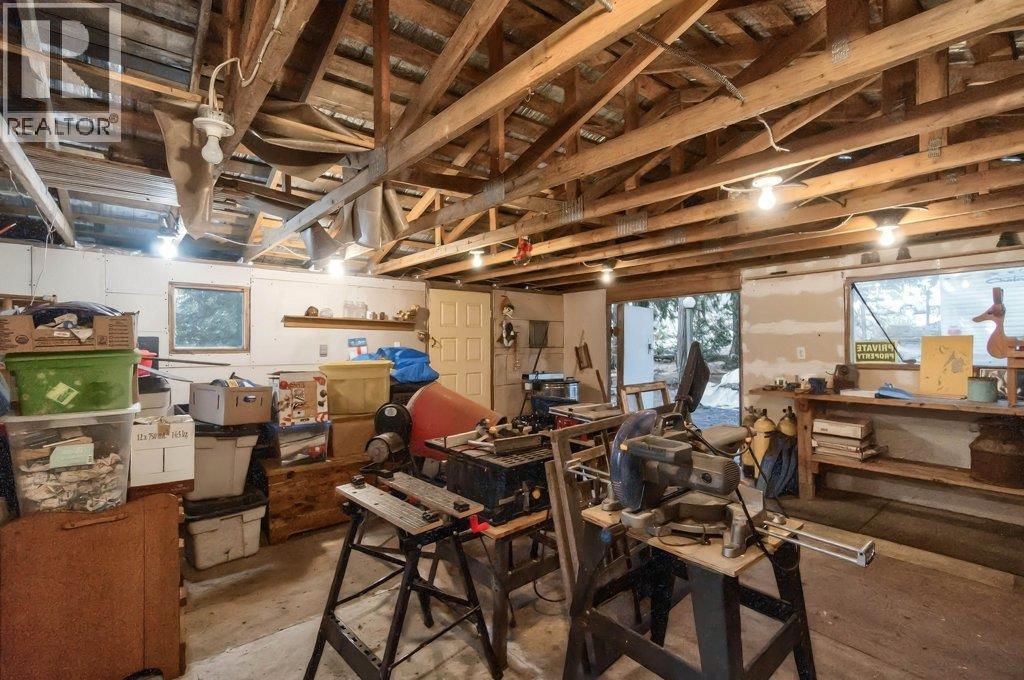 7905 97A Highway, Mara, BC - Indoor Photo Showing Basement