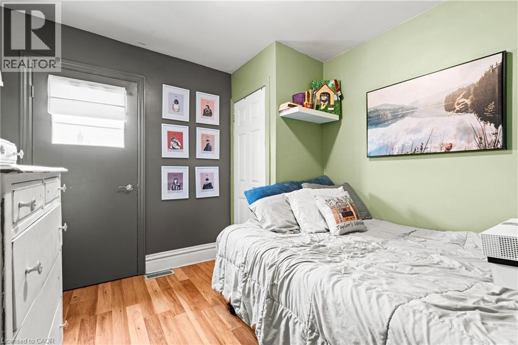 Bedroom with light wood finished floors and a closet - 78 Clyde Street, Hamilton, ON - Indoor Photo Showing Bedroom