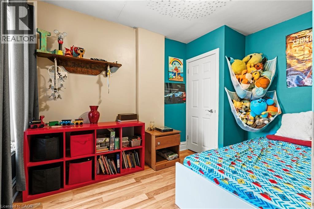 Bedroom featuring light wood-style floors - 78 Clyde Street, Hamilton, ON - Indoor Photo Showing Bedroom