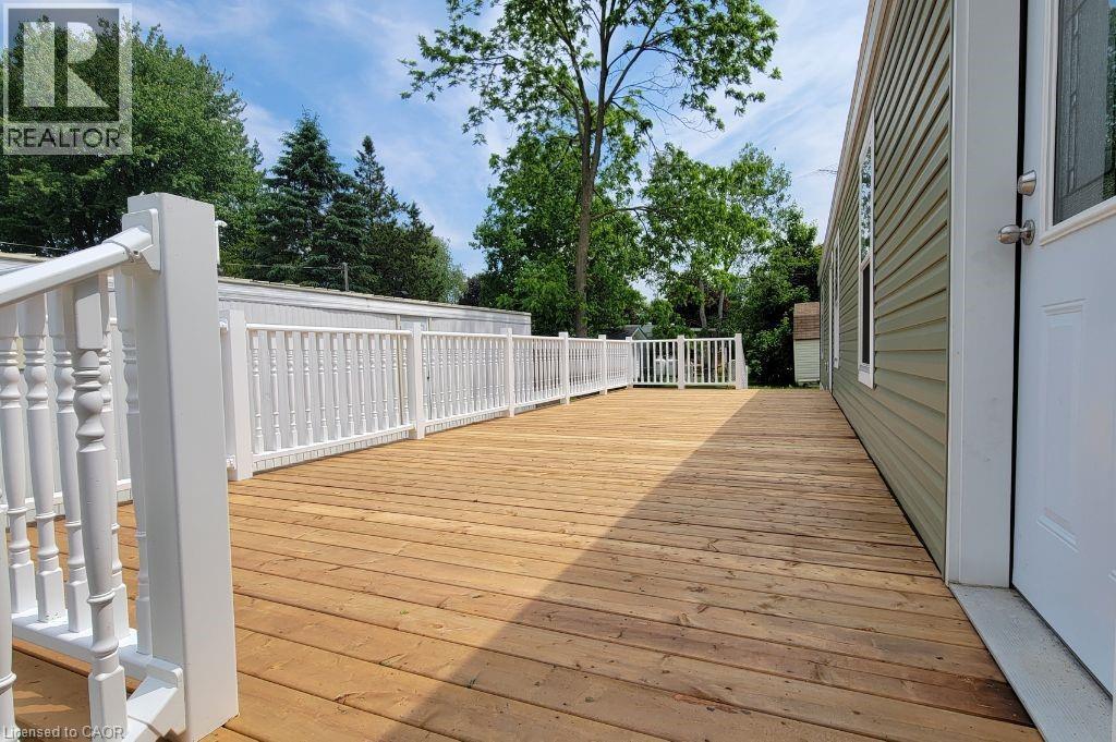 Deck featuring view of scattered trees - 77 Park Lane, Flamborough, ON - Outdoor With Exterior