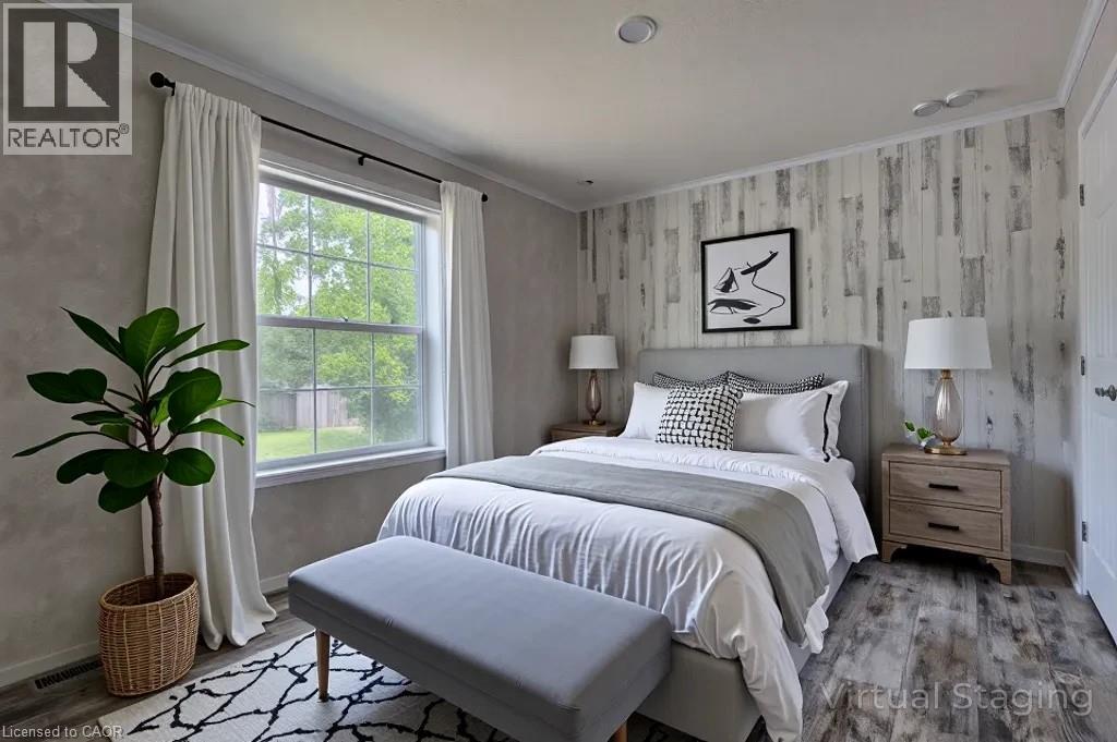 Bedroom featuring ornamental molding and wood finished floors - 77 Park Lane, Flamborough, ON - Indoor Photo Showing Bedroom