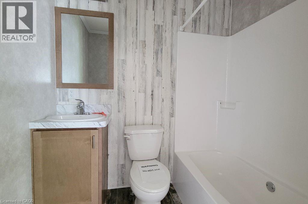 Full bathroom with toilet, vanity, and shower combination - 77 Park Lane, Flamborough, ON - Indoor Photo Showing Bathroom