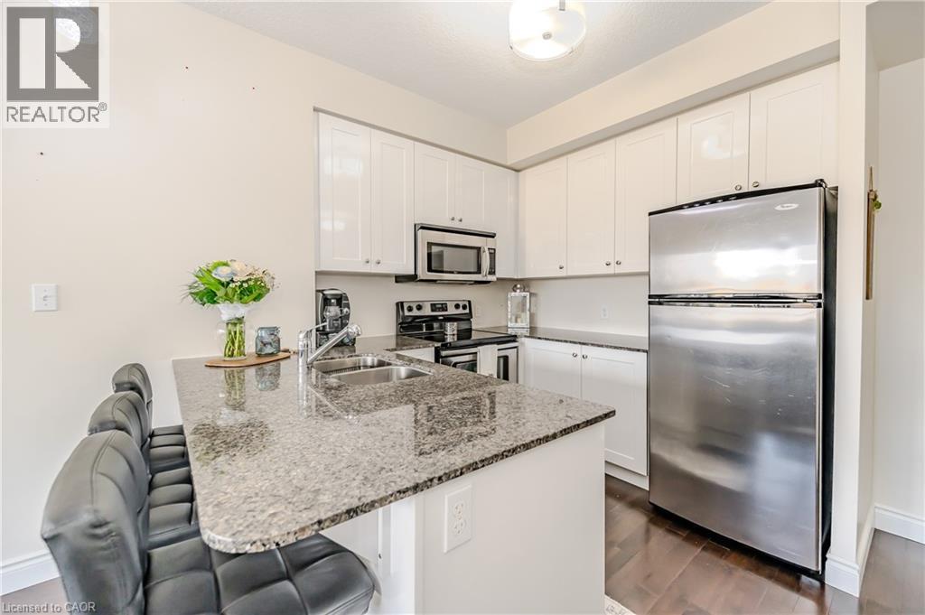 170 Water Street N Unit# 807, Cambridge, ON - Indoor Photo Showing Kitchen With Double Sink