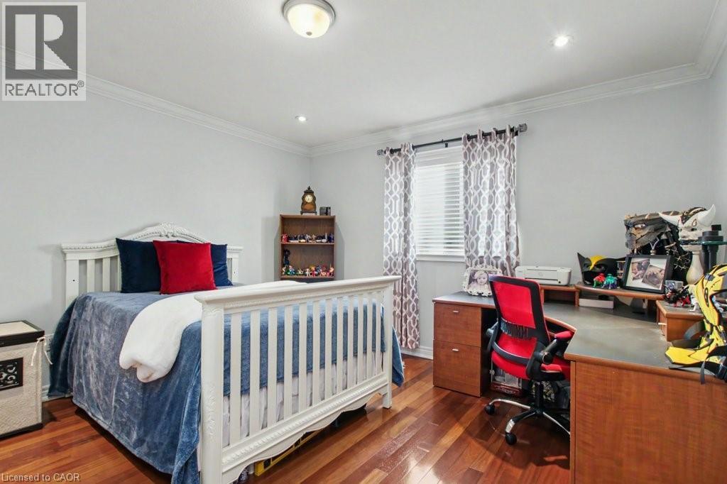 Bedroom featuring an office area, crown molding, dark wood-style floors, and recessed lighting - 284 Normanhurst Avenue, Hamilton, ON - Indoor Photo Showing Bedroom