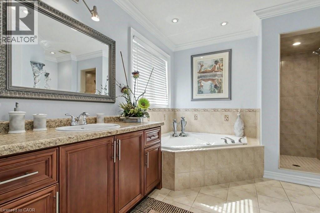 Full bathroom with vanity, a stall shower, light tile patterned floors, a garden tub, and recessed lighting - 284 Normanhurst Avenue, Hamilton, ON - Indoor Photo Showing Bathroom