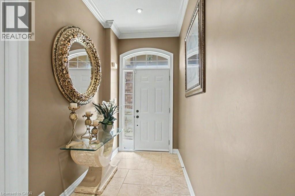 Foyer with ornamental molding and baseboards - 284 Normanhurst Avenue, Hamilton, ON - Indoor Photo Showing Other Room