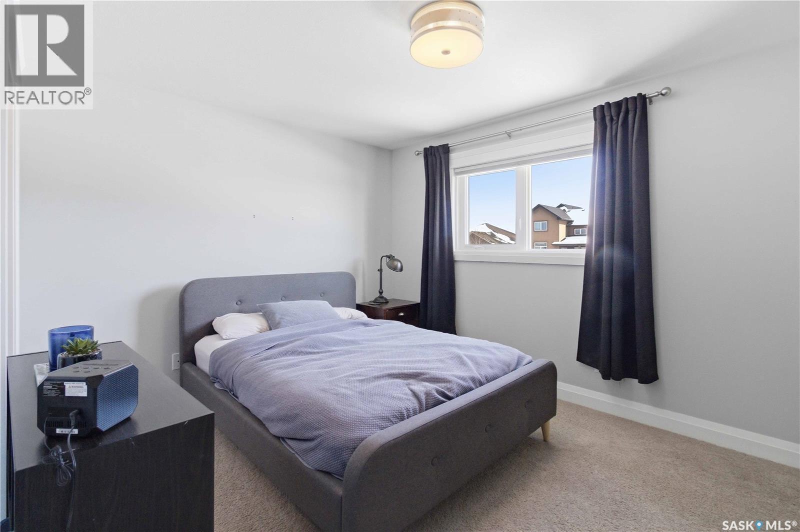 23 111 Rosewood Gate N, Saskatoon, SK - Indoor Photo Showing Bedroom