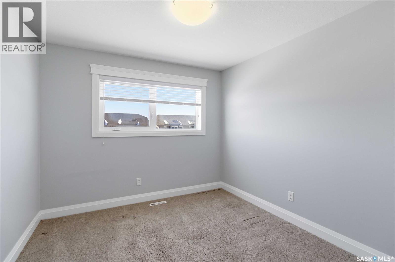 23 111 Rosewood Gate N, Saskatoon, SK - Indoor Photo Showing Other Room