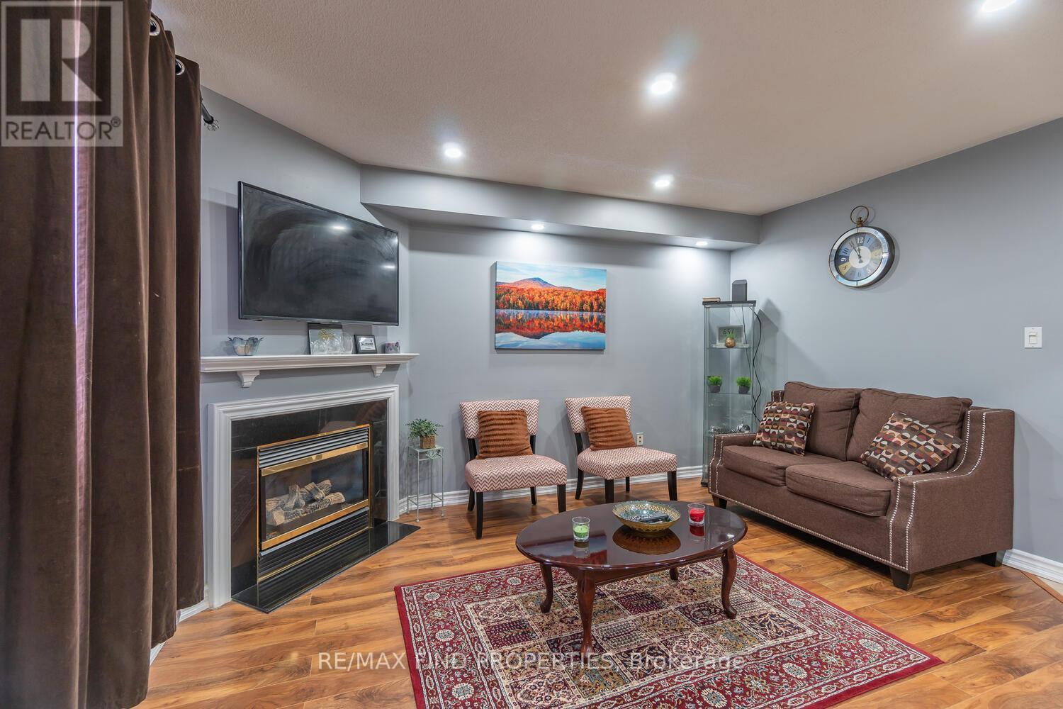 22 Ashmere Road, Brampton, ON - Indoor Photo Showing Living Room With Fireplace
