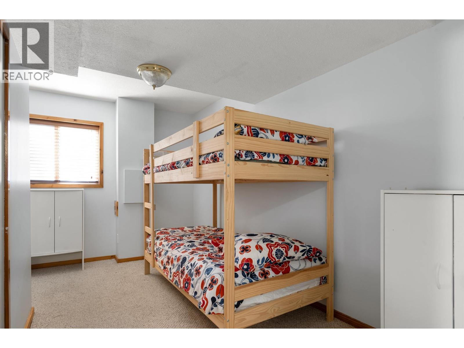 4943 Timber Way, Windermere, BC - Indoor Photo Showing Bedroom