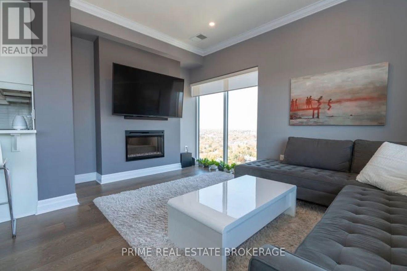 2503 - 505 Talbot Street, London East (East F), ON - Indoor Photo Showing Living Room With Fireplace