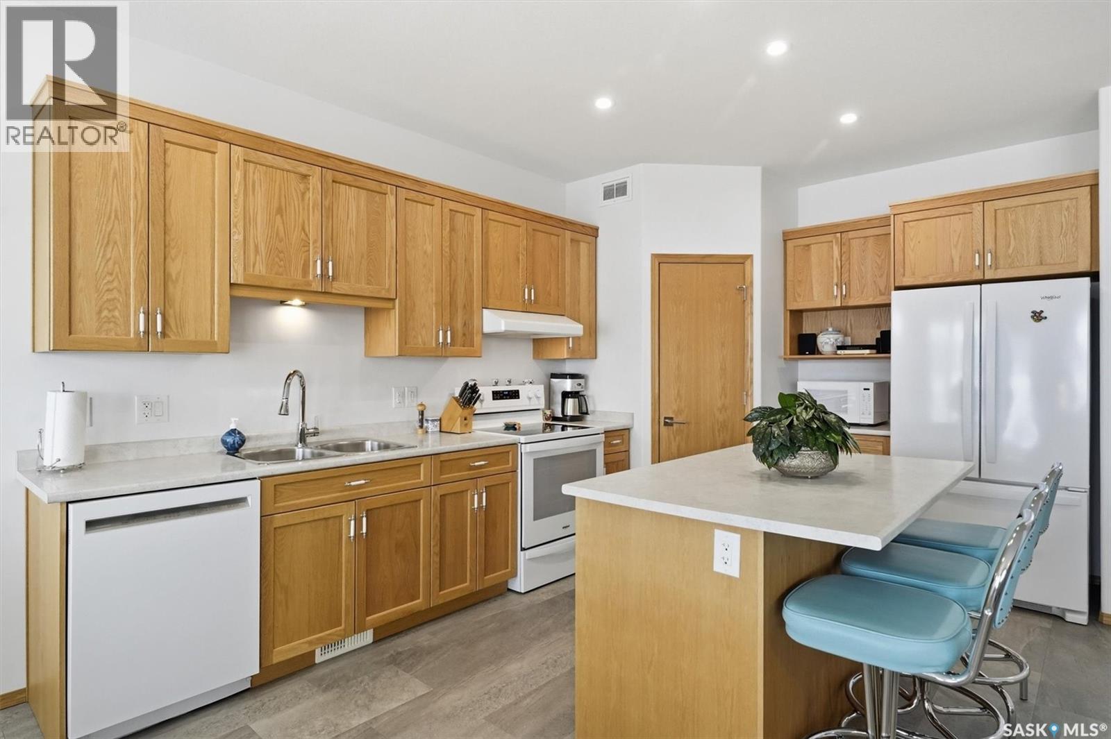 13 315 Olson Lane W, Saskatoon, SK - Indoor Photo Showing Kitchen With Double Sink