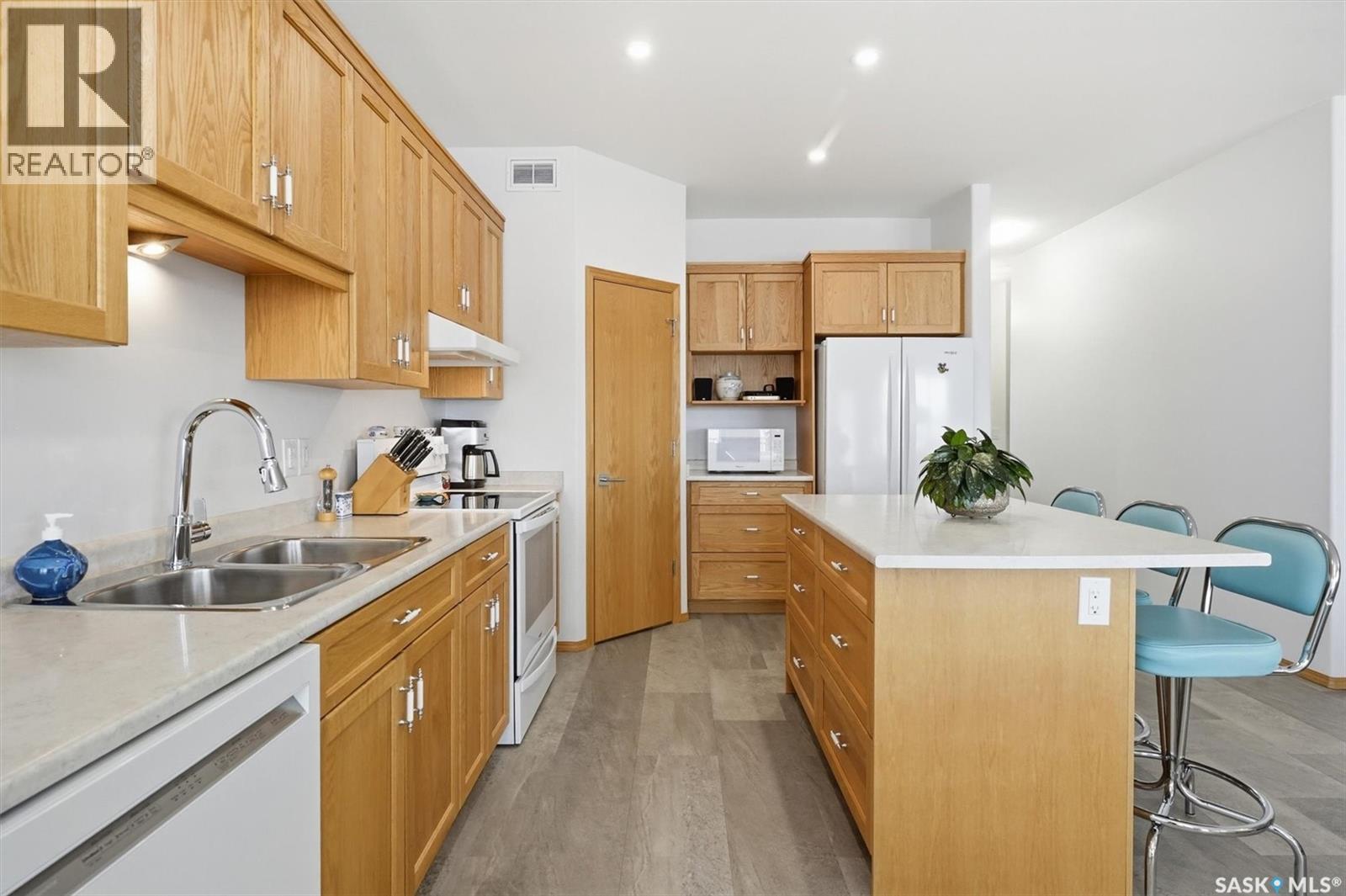 13 315 Olson Lane W, Saskatoon, SK - Indoor Photo Showing Kitchen With Double Sink