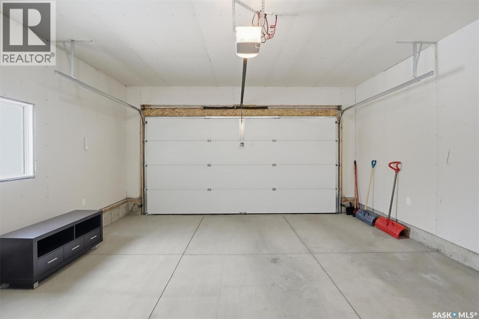 13 315 Olson Lane W, Saskatoon, SK - Indoor Photo Showing Garage