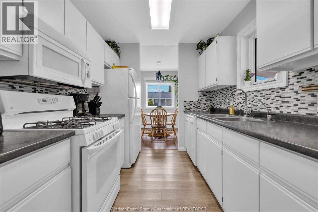76 Cherry, Mcgregor, ON - Indoor Photo Showing Kitchen With Double Sink