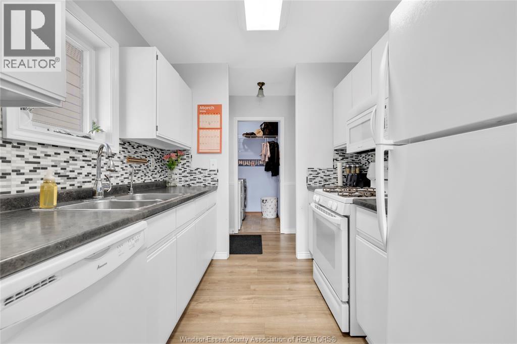 76 Cherry, Mcgregor, ON - Indoor Photo Showing Kitchen With Double Sink