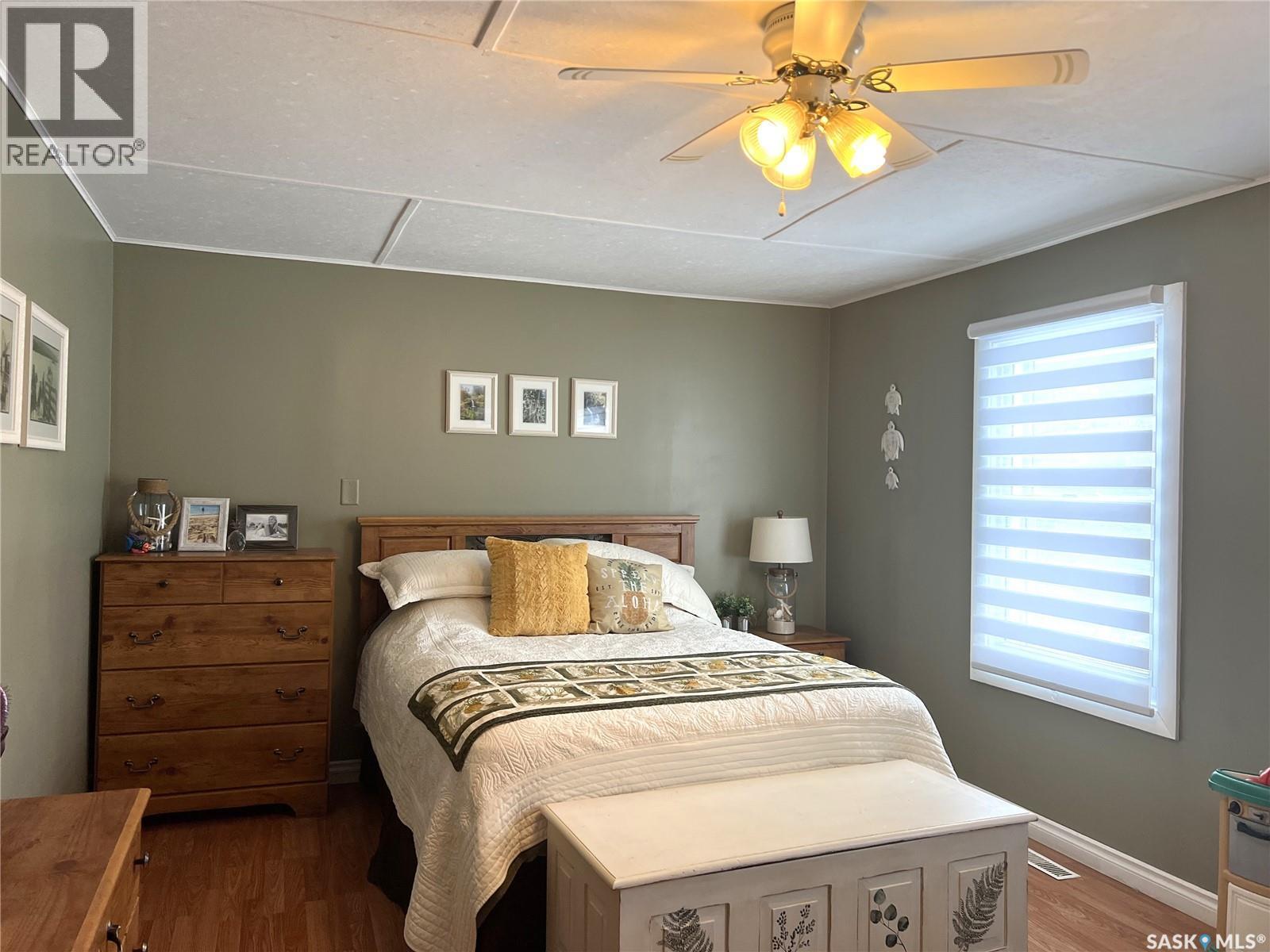 113 2Nd Avenue Se, Dorintosh, SK - Indoor Photo Showing Bedroom