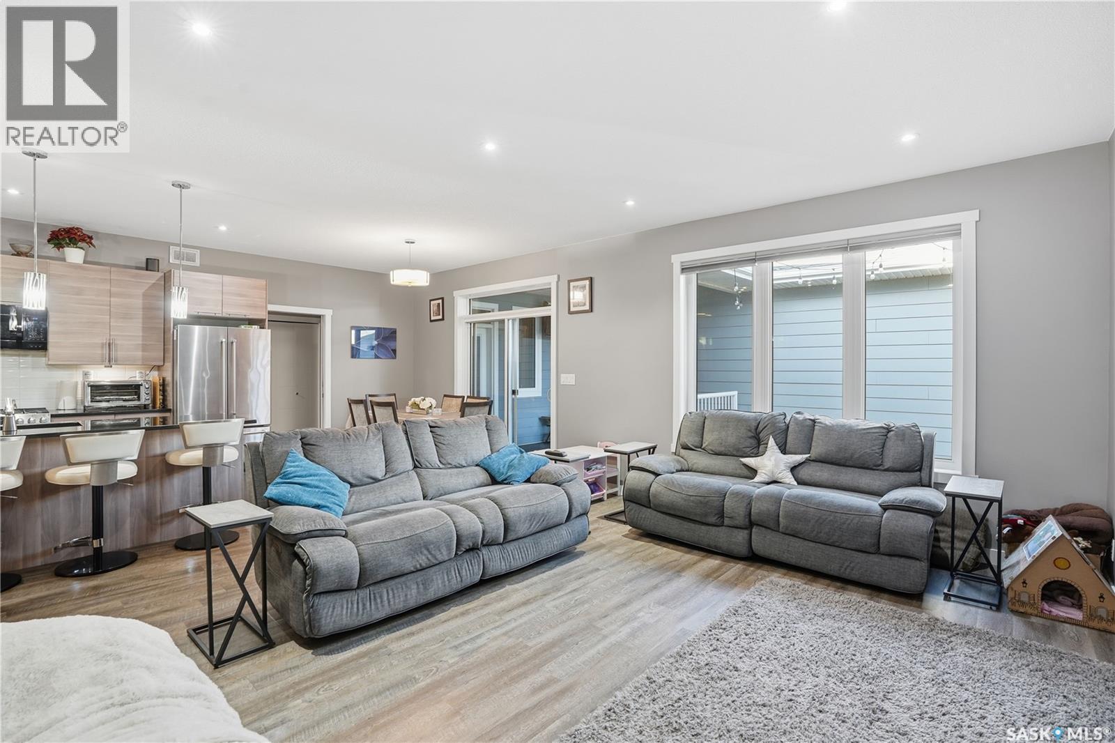 4202 Green Olive Way E, Regina, SK - Indoor Photo Showing Living Room