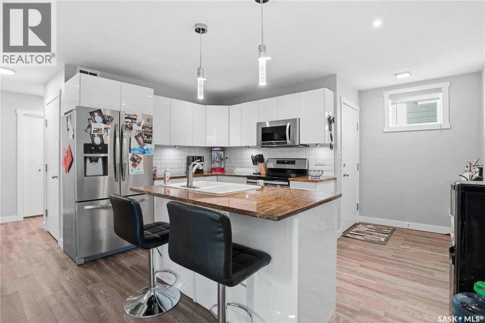4202 Green Olive Way E, Regina, SK - Indoor Photo Showing Kitchen With Double Sink With Upgraded Kitchen