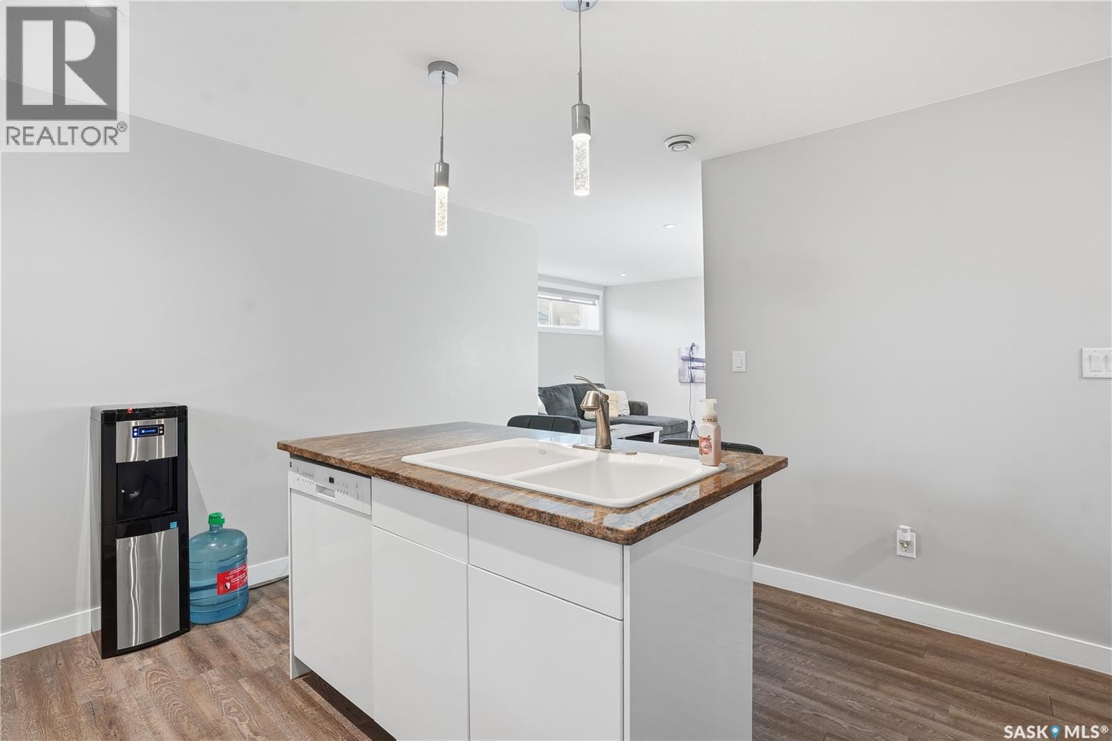 4202 Green Olive Way E, Regina, SK - Indoor Photo Showing Kitchen With Double Sink