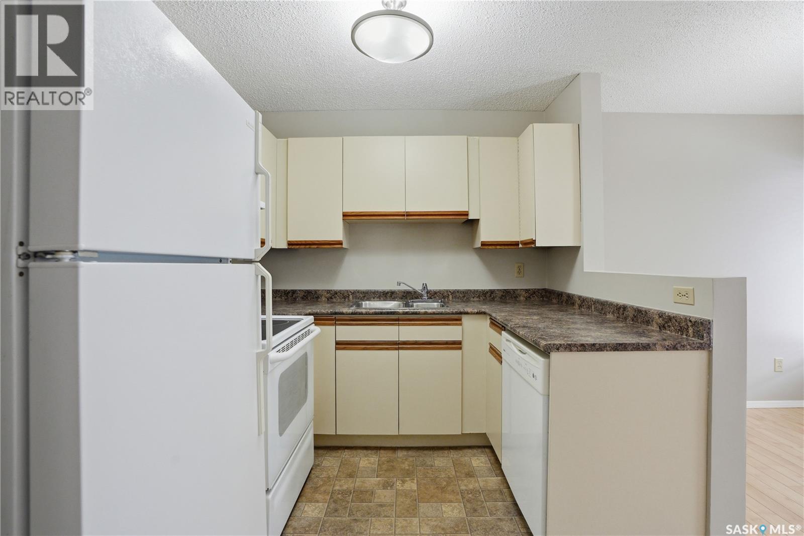 102 503 Tait Crescent, Saskatoon, SK - Indoor Photo Showing Kitchen
