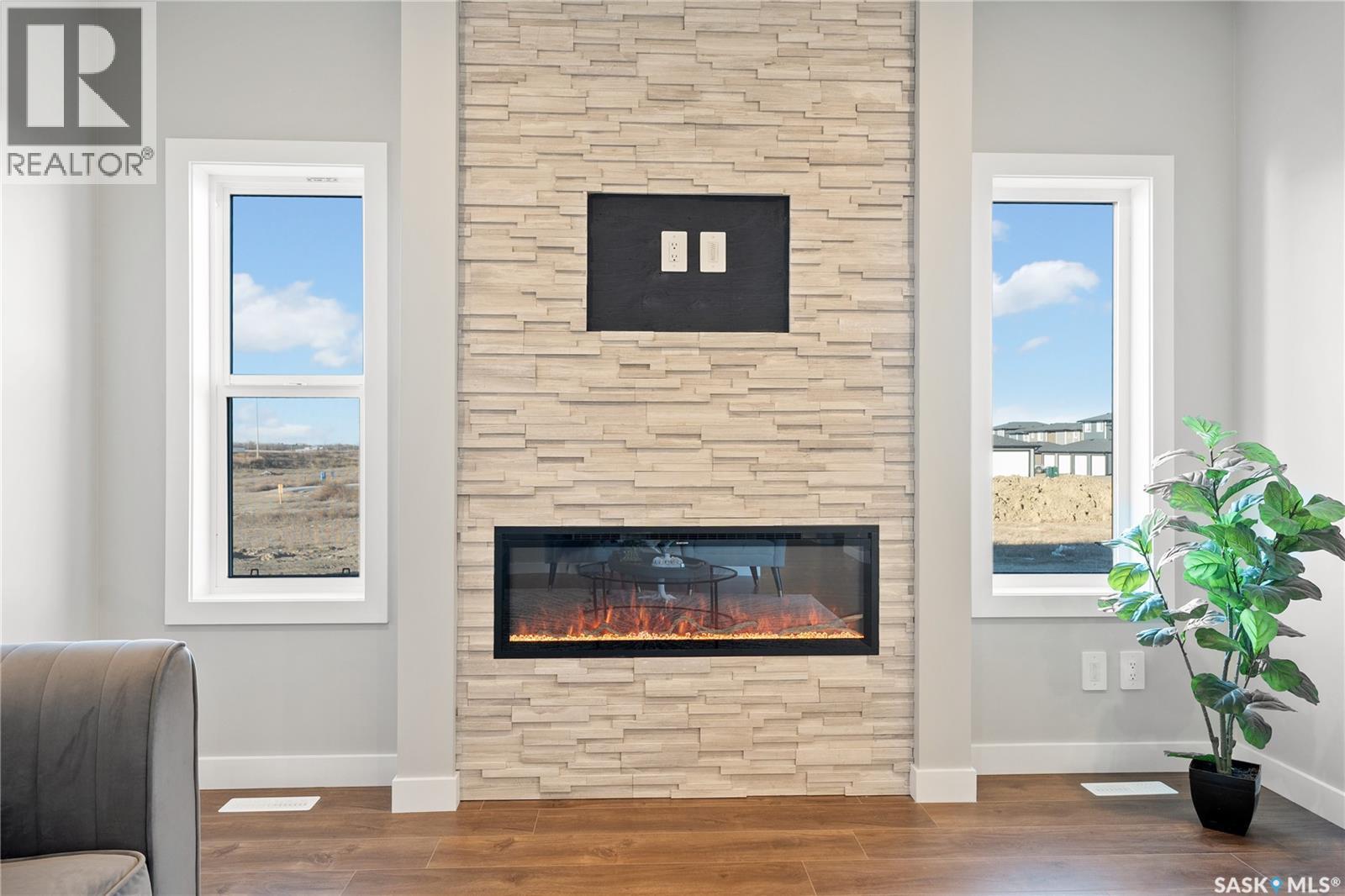 10 Vancouver Crescent, Pilot Butte, SK - Indoor With Fireplace